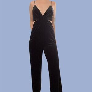 Black velvet jumpsuit with cut